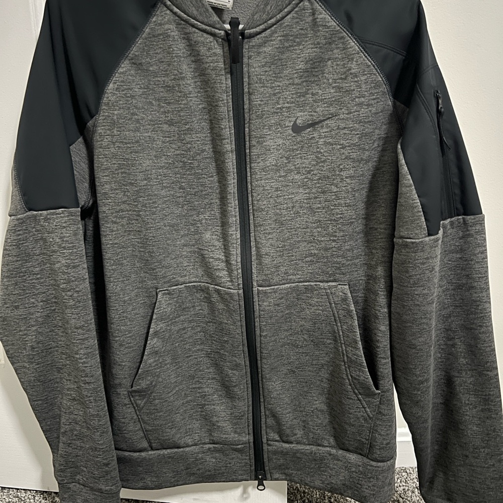 Brand new Nike Men's Gray and Black Tech Jacket